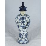 A Chinese blue and white porcelain figure of an official holding a Ruyi, impressed marks to base,