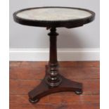 A small 19th century stained mahogany occasional table, the circular top decorated with an