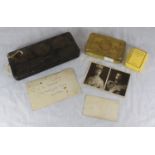 A Princess Mary Christmas 1914 tin containing two packets of cigarettes, (one sealed one full but