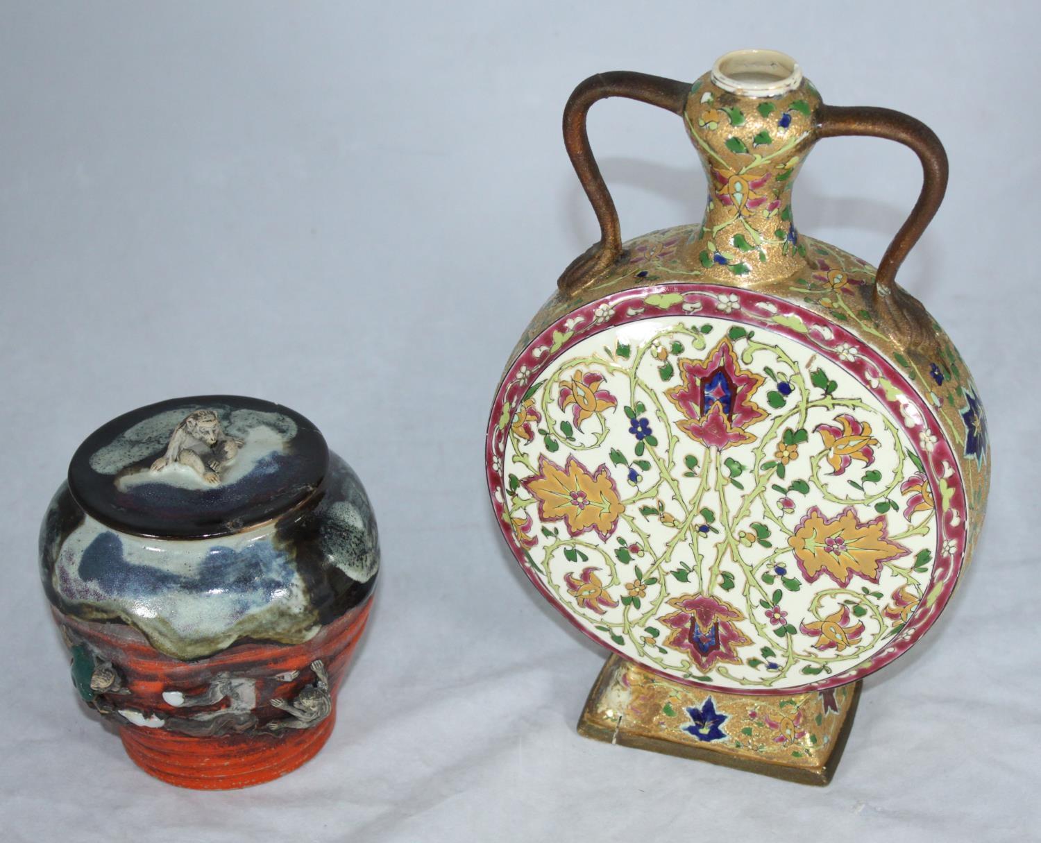 An antique Japanese Sumida Gawa Pottery lidded jar and cover, the sides decorated with moulded