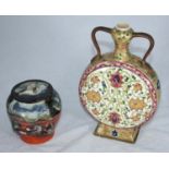 An antique Japanese Sumida Gawa Pottery lidded jar and cover, the sides decorated with moulded