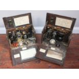 Two WWII field telephones in wooden cases