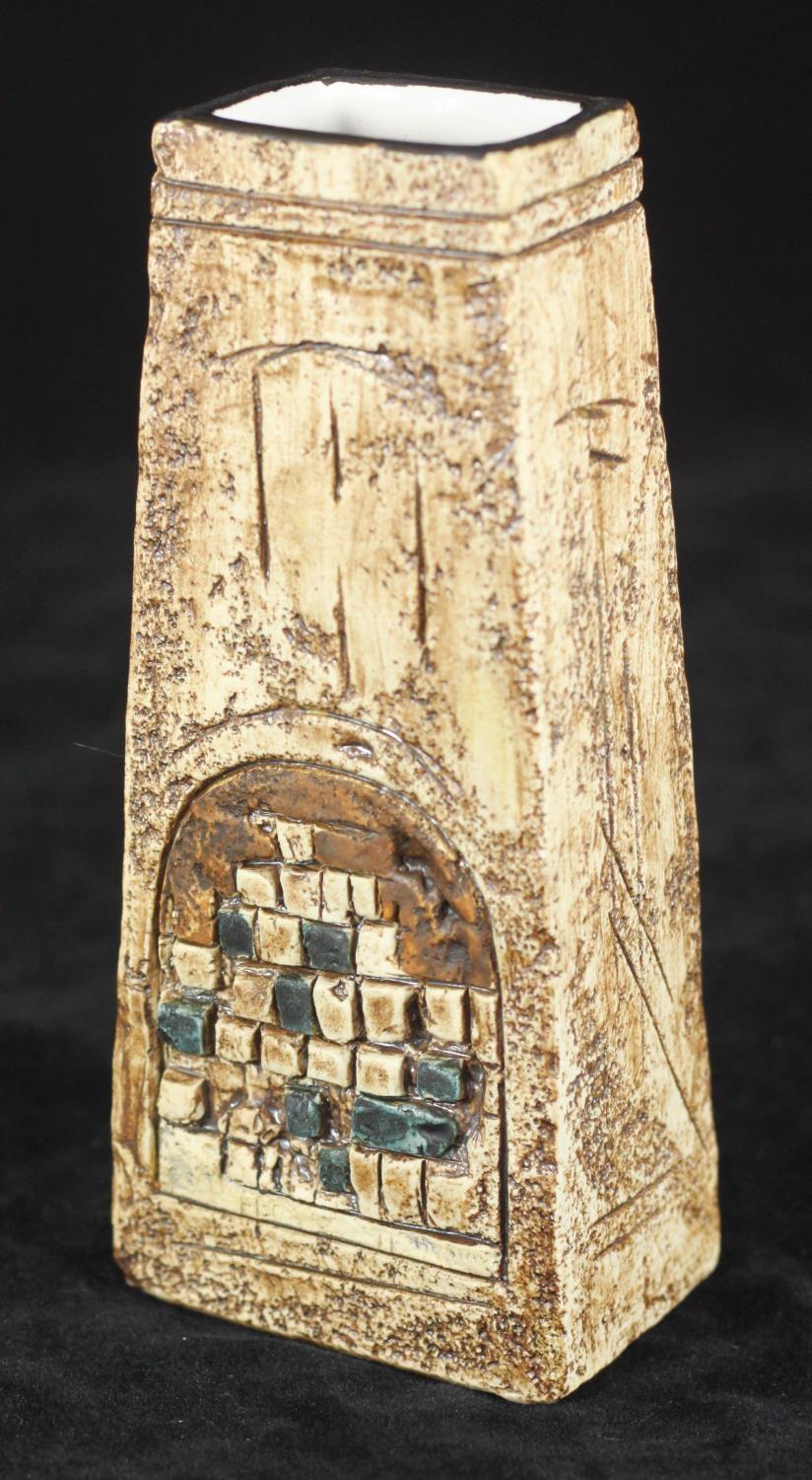 A Troika pottery Coffin vase, decorated in cream, brown and greens, signed to the base, approx. 17cm