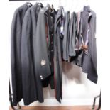 Two wool foul-weather cloaks, two blues jackets and four pairs of trousers, sizes 15,16 and 17