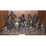 SECTION 33. Twelve various bronzed resin figures including fishermen, dog rounding up sheep,