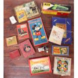 A collection of various boxed vintage toys, games and books including a Choo Choo Loco