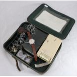 A 1950s Protona Spy Watch with P55 Minifon Recorder and accessories in original green vinyl case.