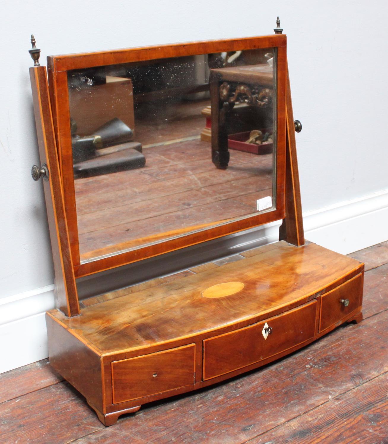 A 19th century inlaid mahogany platform toilet mirror, the rectangular mirror above a platform