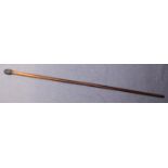 A Victorian walking stick with plain shaft, the silver collar with beaded decoration and the