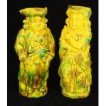 A pair of Mintons Toby jugs 'Barrister' and 'Lady with a Fan', in yellow, green and brown