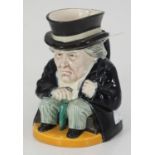 A Lord Herbert Asquith character jug (Political Commemoratives), coloured paint and yellow base,