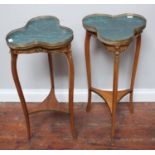 A pair of French occasional tables in the Louis XVI style, with brass galleried trefoil tops,