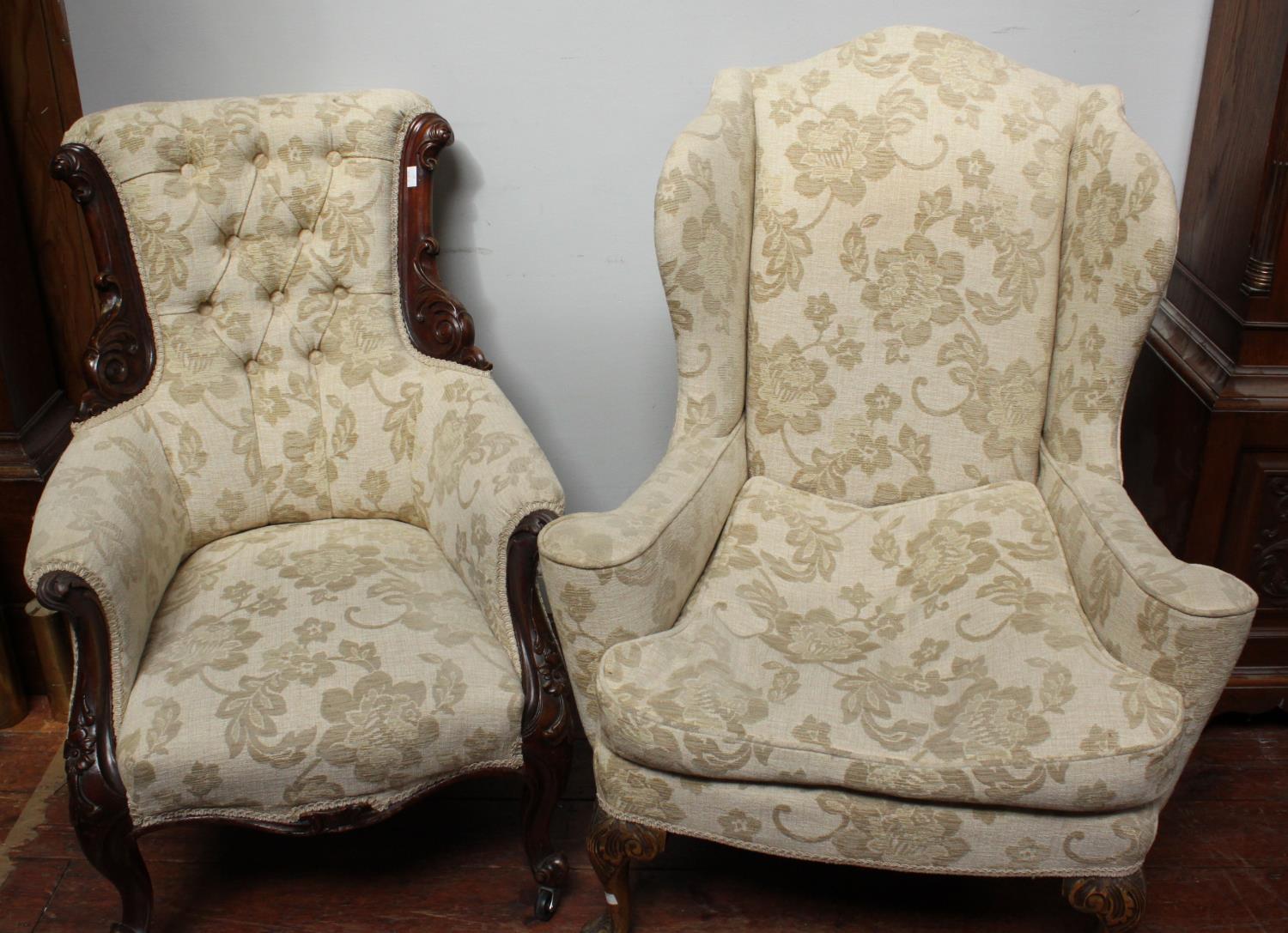 A Victorian deep-buttoned armchair in beige floral upholstery with wooden floral carved detailed,