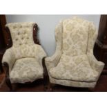 A Victorian deep-buttoned armchair in beige floral upholstery with wooden floral carved detailed,