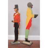 Two painted wooden profile dumb waiters, one modelled as a soldier of the 33rd Foot, 1854, the other