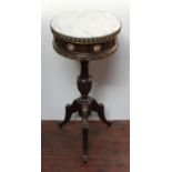 A French stained wood and gilt-metal mounted circular drum-top table with grey marble top, on