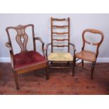 An 18th c mahogany carver chair in the Chippendale style, with drop-in seat, together with a rush-