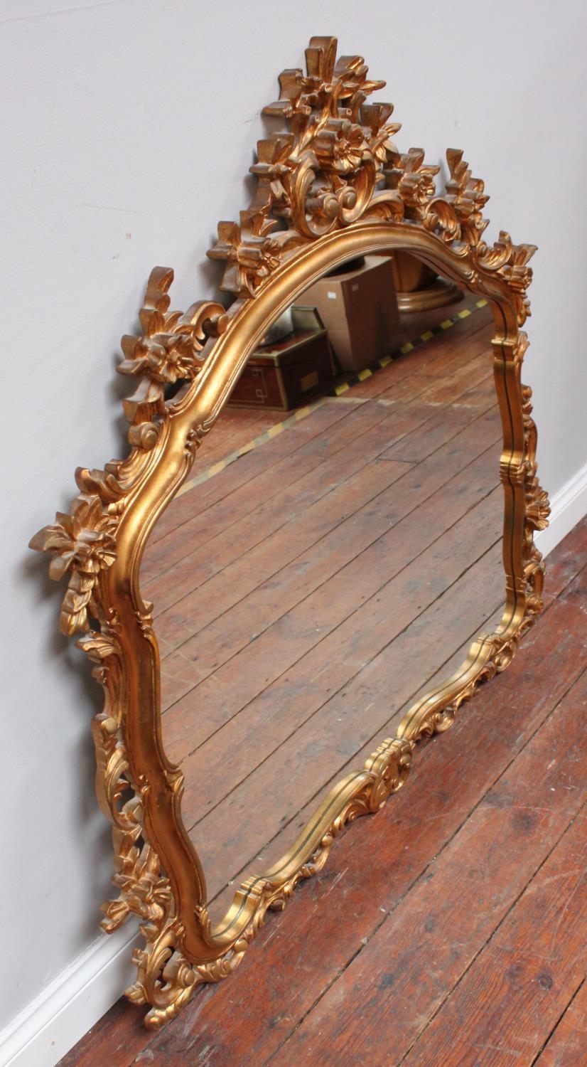 A large over-mantel mirror in ornately carved, foliate gilt frame, 120cm wide - Image 2 of 2