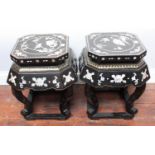 A pair of modern oriental black lacquer garden seats or vase stands, with mother-of-pearl inlay