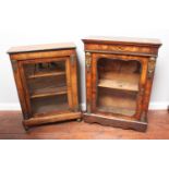 A Victorian burr walnut pier cabinet with floral inlaid decoration and applied brass mounts, the