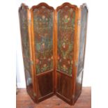 A late 19th/early 20th century four-fold dressing screen or room divider with shaped tops and panels