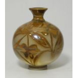 An unusual lustre vase of globular form with flared rim, possibly Pilkingtons Royal Lancastrian,
