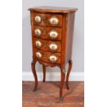 An early 20th century French walnut narrow chest in the Louis XVI style, four short bow-front