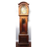 An Edwardian oak longcase clock, with 8-day striking and chiming movement (Westminster,