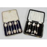 A cased set of six silver teaspoons with crossed hockey stick finials, Sheffield, 1933, maker's mark