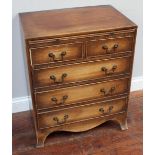 A 20th century mahogany bachelor's chest of two short and three long graduated drawers, with