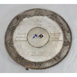 A large Edwardian silver circular presentation salver, the pierced rim decorated with swags and