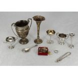 A quantity of silverware including miniature trophies and a cocktail glass, spill vases (one with