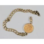 A 9ct gold flat curb-link bracelet, loose hung in circular mount with an ERII 1982 half-sovereign,