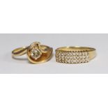 Rowans Appeal - An 18ct gold and diamond ring, 33 diamonds in a band of three rows, approx.