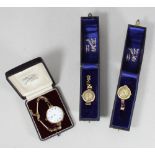 Two various boxed ladies 9ct gold cased cocktail watches, together with another 9ct gold wristwatch,