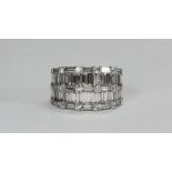 An 18 carat white gold five row wide band ring set with baguette and round brilliant cut diamonds.