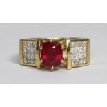 An 18 carat gold, ruby and diamond ring, centrally six-claw set a cushion-cut ruby, of good