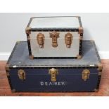 A large blue and metal banded trunk stamped 'D E Airey' together with a smaller silver and metal