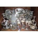 SECTION 35. Silver-plated wares including four various trays, large glass water jug, set of six