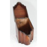 A George III mahogany knife box with sloped top and serpentine front, internal compartments lacking