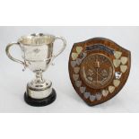 A silver twin-handled trophy raised on circular base, engraved, hallmarked Chester, 1907, maker's