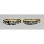 An 18ct gold and three-stone platinum set diamond ring, diamond weight approx. 30 points, size O,