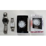 Four modern stainless steel watches including a Tavistock & Jones radio controlled talking watch and