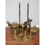 A quantity of brassware including candlesticks, log bins bed warming pans and an incense burner etc.