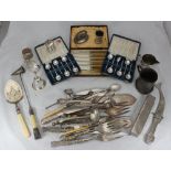 Various silver-plated flatware including fish servers, carving sets, pickle forks and meat skewer