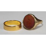 A 22ct gold wedding ring, 4.88 grams, together with a 9ct gold gents signet ring with intaglio