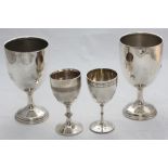 A Victorian silver goblet with engraved decoration to rim and foot, the base with beaded edge,