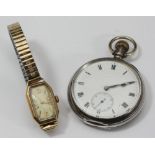 A 9ct gold cased Dennison ladies wristwatch, rectangular face with Arabic numerals, later strap,