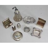 A silver-mounted glass perfume atomiser, and two-each silver perfume bottles, silver bonbons,