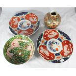 A pair of Japanese Imari chargers, 30cm diam, together with a Chinese porcelain 'Famille Verte' bowl